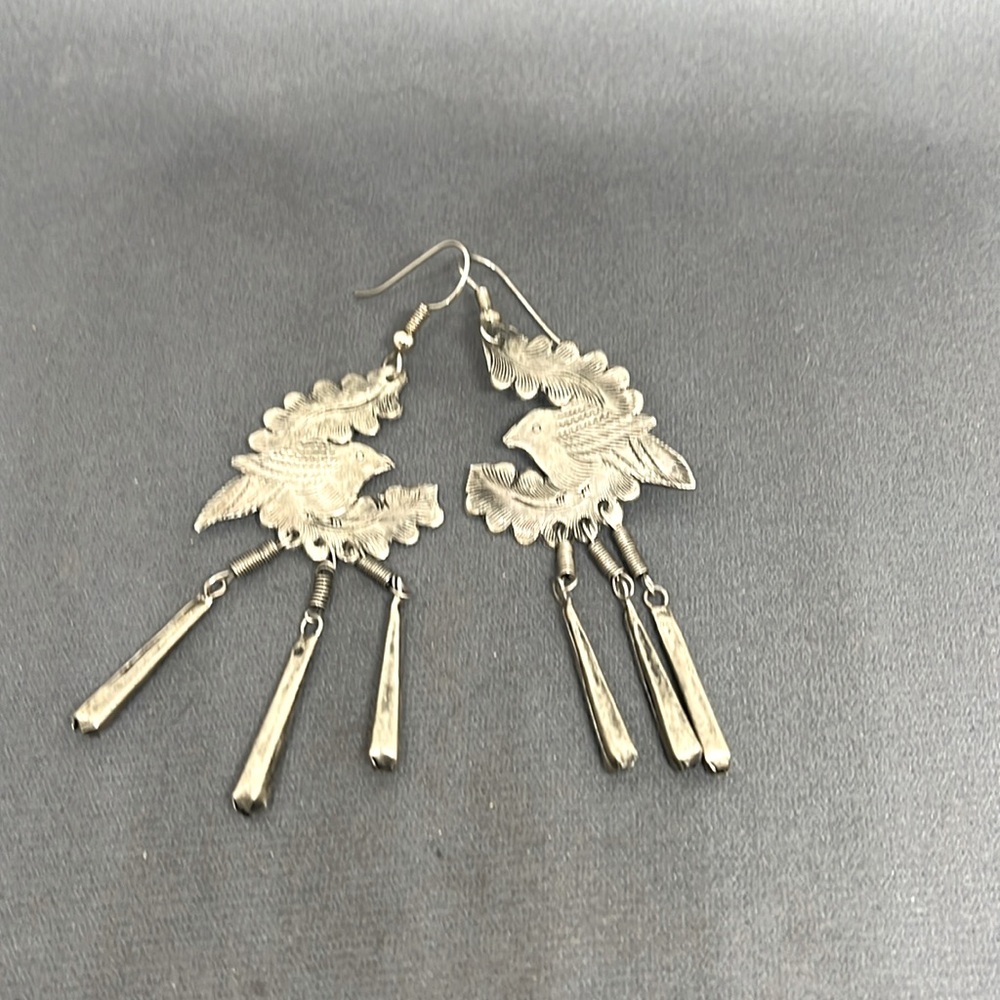 Silver Balinese bird earrings.